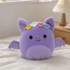 A cute purple bat doll with a colorful little flower decoration on its head is a fun fabric ornament for children's gifts and collectibles details Picture
